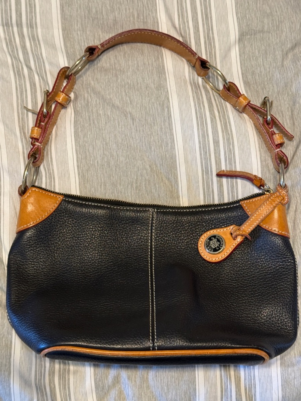 Dooney & Bourke Black and tan leather purse